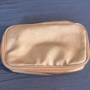 Rose colored makeup bag